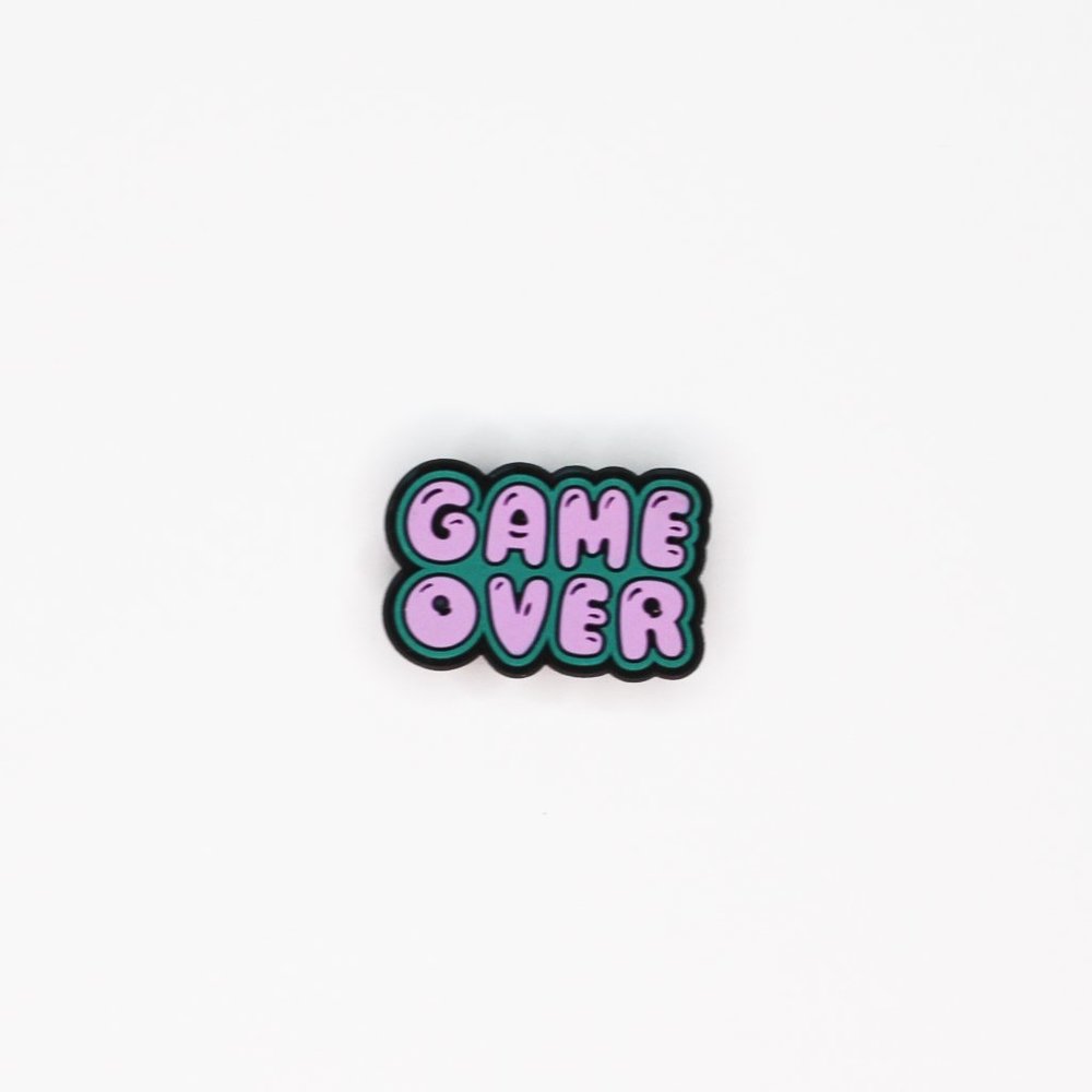 Game over croc charm